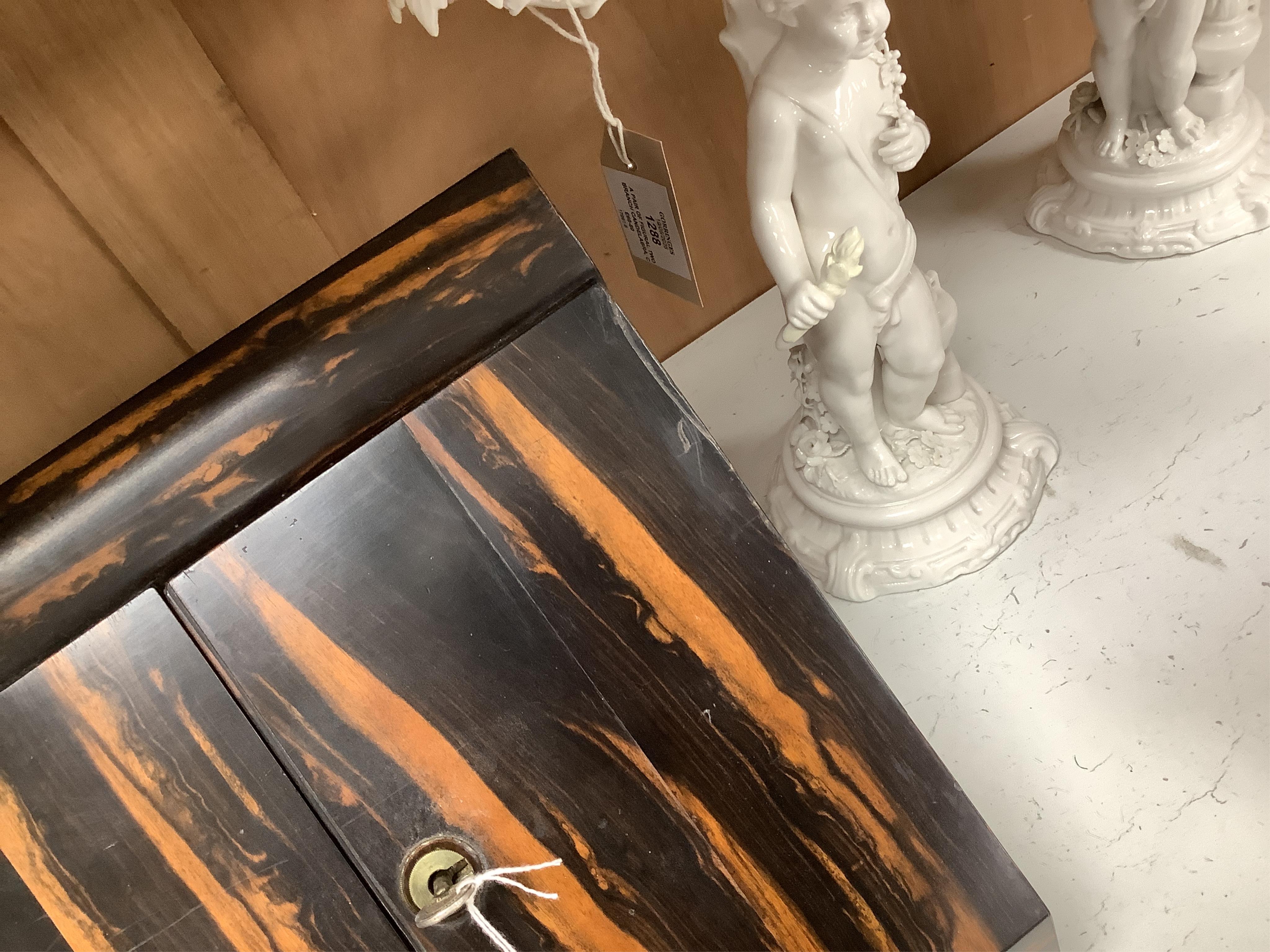 A coromandel desk top stationery box with letter rack and calendar, 29cm wide